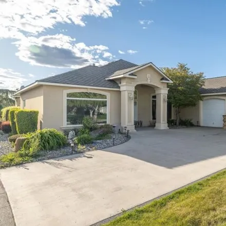 Buy this 4 bed house on 1360 West Canyon Lakes Drive in Kennewick, WA 99337