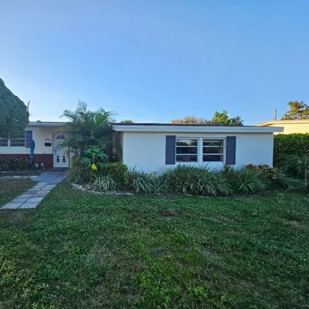 Rent this 3 bed house on 4181 Northwest 12th Terrace in Twin Lakes, Broward County