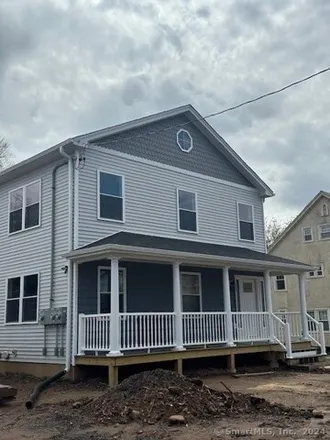 Rent this 3 bed house on 92 Vine Street in New Britain, CT 06052