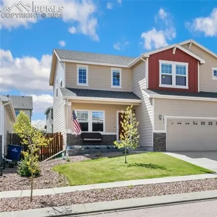 Buy this 5 bed house on 7917 Chasewood Loop in Colorado Springs, CO 80908