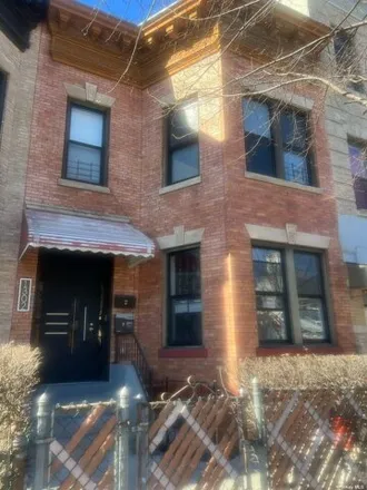 Buy this 5 bed house on 1302 Rogers Avenue in New York, NY 11210