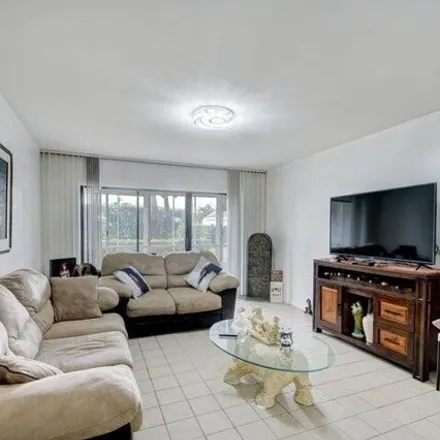 Rent this 2 bed condo on Via Poinciana Drive in Park Pointe, Palm Beach County