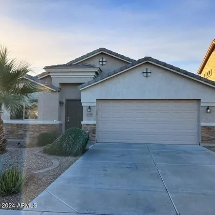 Rent this 3 bed house on 45695 West Sky Lane in Maricopa, AZ 85139