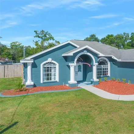 Buy this 4 bed house on 3291 Dothan Avenue in Spring Hill, FL 34609