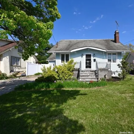 Buy this 4 bed house on 3299 4th Street in Oceanside, NY 11572