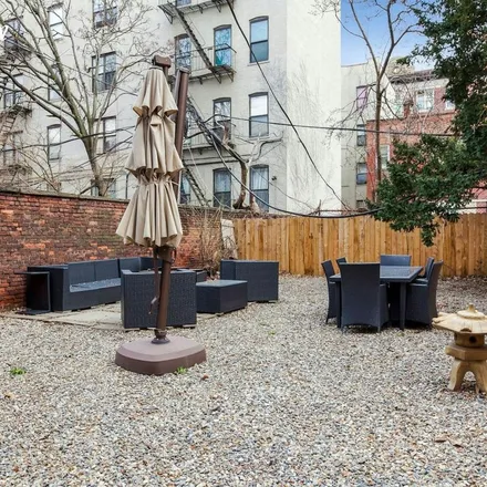 Rent this 4 bed townhouse on 672 Saint Marks Avenue in New York, NY 11216