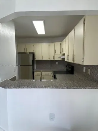 Image 3 - 7075 Northwest 186th Street, Country Club, Miami-Dade County, FL 33015, USA - Condo for rent