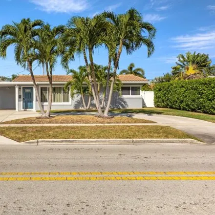Rent this 3 bed house on 961 Southeast 13th Court in Fairlawn, Deerfield Beach