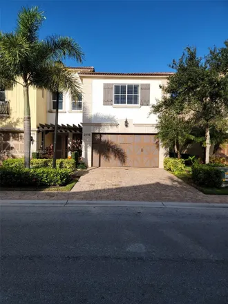Buy this 3 bed loft on 2119 Sabal Tree Court in West Palm Beach, FL 33411