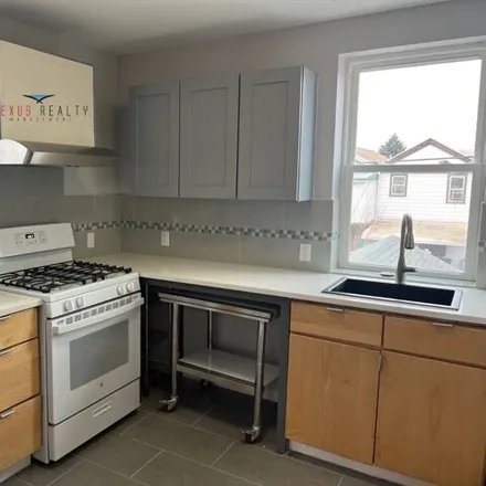 Rent this 2 bed house on 24-32 96th Street in New York, NY 11369