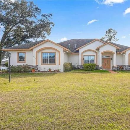 Buy this 4 bed house on 6108 Southeast 10th Place in Marion County, FL 34472