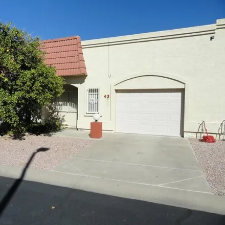 Rent this 2 bed townhouse on East McKellips Road in Mesa, AZ 85125