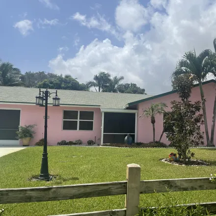 Buy this 3 bed house on 3298 Vagabond Road in Seminole Manor, Palm Beach County