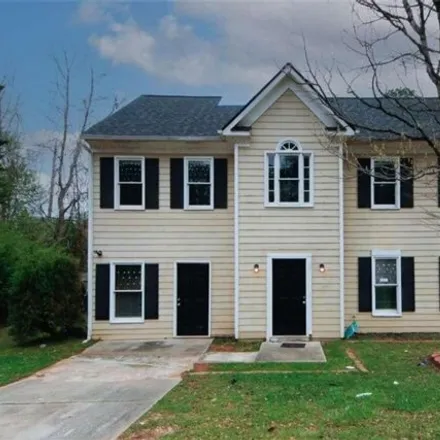 Buy this 4 bed house on 5593 La Fleur Trail in Stonecrest, GA 30038
