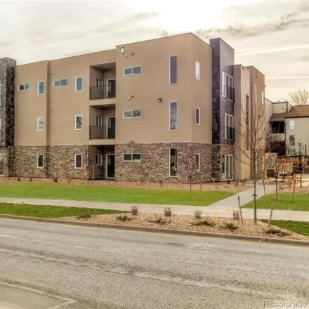 Buy this 2 bed condo on East Hampden Avenue in Aurora, CO 80014