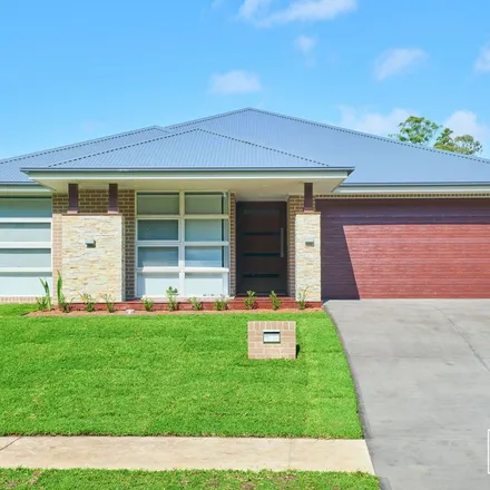Rent this 4 bed apartment on Platypus Parade in Lake Cathie NSW 2445, Australia