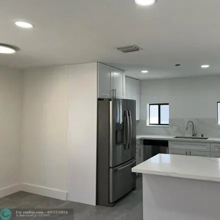 Rent this 3 bed house on 78 Northwest 52nd Street in Miami, FL 33127