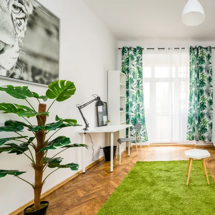Rent this 6 bed room on Henryka Siemiradzkiego 10a in 60-763 Poznan, Poland