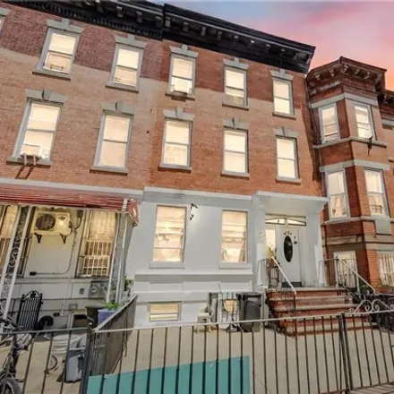 Buy this 9 bed house on 1725 79th Street in New York, NY 11214