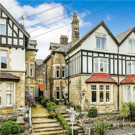 Buy this 6 bed townhouse on Spring Grove in Harrogate, HG1 2HS