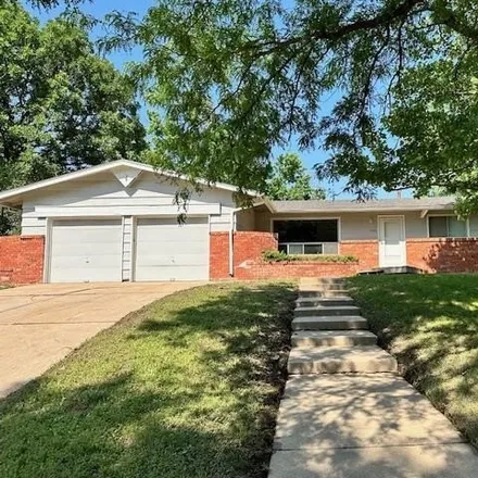Buy this 4 bed house on 7454 Warren Street in County Acres, Wichita
