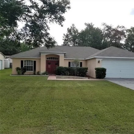 Rent this 3 bed house on 2103 Godfrey Avenue in Spring Hill, FL 34609