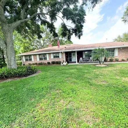 Rent this 3 bed house on 407 Birksdale Court in Polk County, FL 33884