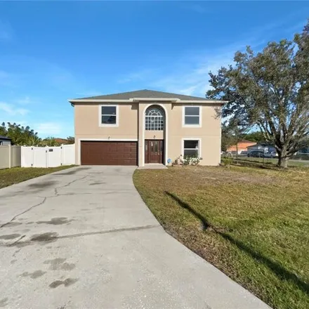 Buy this 4 bed house on 90 Peterlee Court in Poinciana, FL 34758