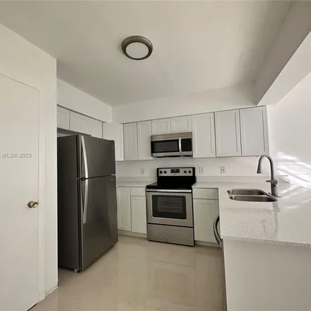 Rent this 3 bed apartment on 514 Northwest 42nd Court in Bonnie Lock, Deerfield Beach