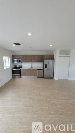 Rent this 3 bed apartment on 6336 SW 27th St