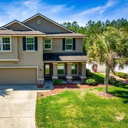 Buy this 4 bed house on 441 West Adelaide Drive in Fruit Cove, FL 32259