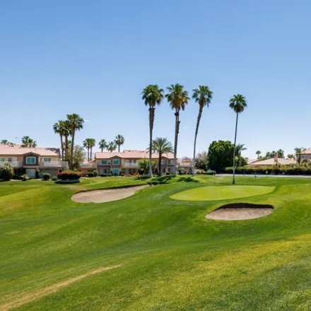 Rent this 2 bed condo on Palm Royale Country Club in Emerald Drive, La Quinta