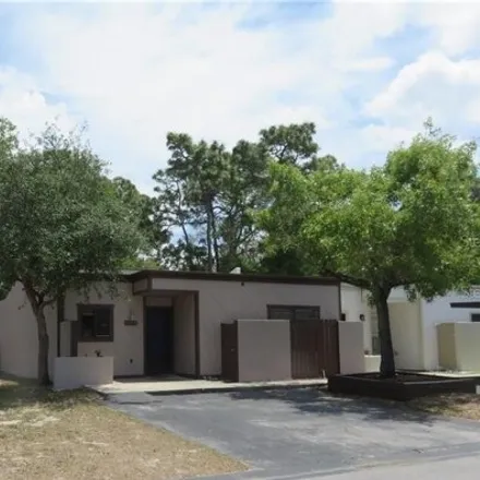 Rent this 3 bed house on 2220 Oak Wind Drive in Holiday, FL 34691