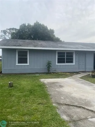 Rent this 2 bed house on 6571 Palomar Parkway in Lakewood Park, FL 34951