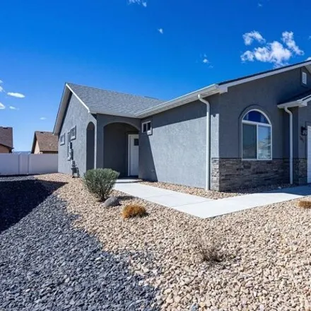 Buy this 3 bed house on 2868 Valentino Way in Grand Junction, CO 81501
