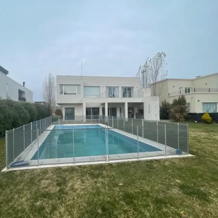 Rent this 4 bed house on unnamed road in Bosque de Peralta Ramos, B7603 DRT Mar del Plata