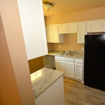 Rent this 2 bed condo on 3115 Clarksville St