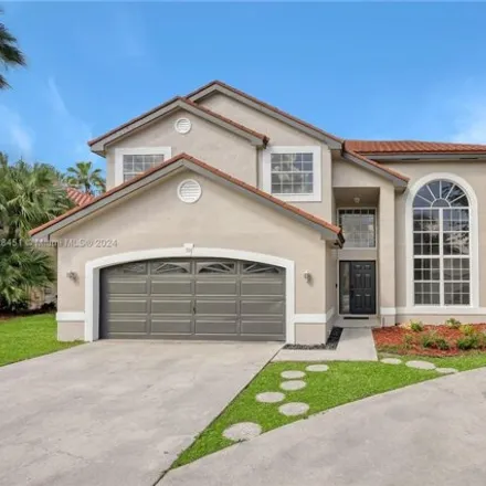 Buy this 5 bed house on 710 Northwest 177th Avenue in Pembroke Pines, FL 33029