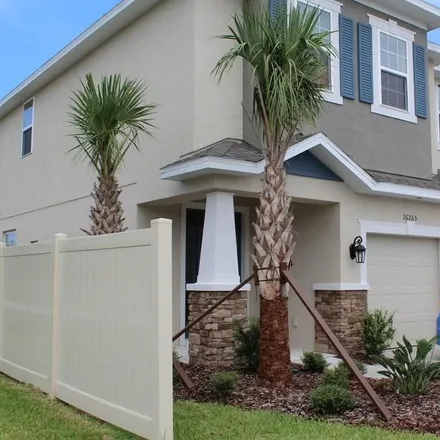 Rent this 3 bed townhouse on Limestone Springs Way in Wesley Chapel, FL 33559