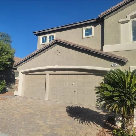 Rent this 4 bed house on 10136 Reflection Brook Avenue in Spring Valley, NV 89148