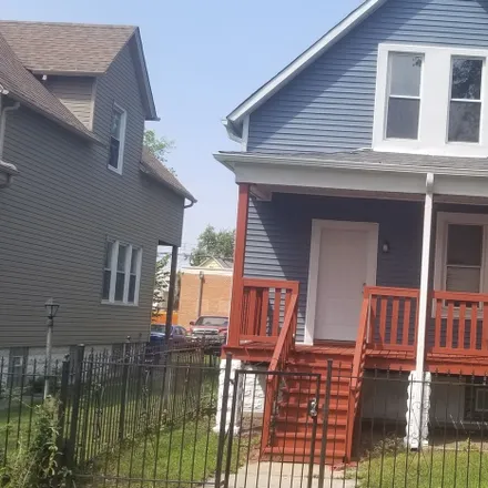 Buy this 4 bed house on 106 West 112th Street in Chicago, IL 60628