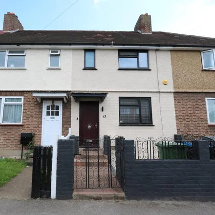 Rent this 3 bed townhouse on Gladstone Road in London, KT6 5DD
