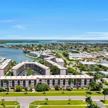 Buy this 1 bed condo on 977 Anglers Cove in Marco Island, FL 34145