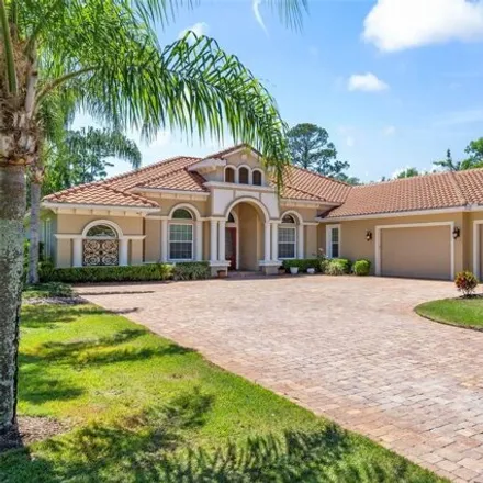 Buy this 4 bed house on 12 Native Oak Ct in Palm Coast, Florida