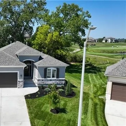Buy this 4 bed house on 1062 Churchill Circle in Raymore, MO 64083