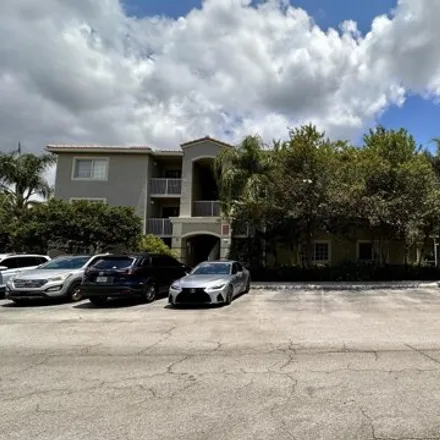 Rent this 1 bed apartment on 5001 Wiles Rd Apt 103 in Coconut Creek, Florida