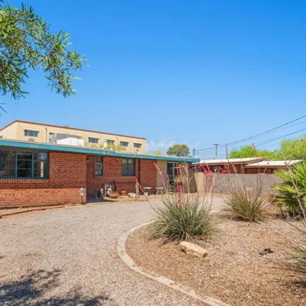 Buy this 3 bed house on La Quinta Inn & Suites in 102 North Alvernon Way, Tucson