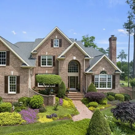 Buy this 4 bed house on Brier Creek Country Club in 9400 Club Hill Drive, Raleigh