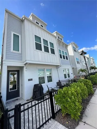 Rent this 3 bed townhouse on Lindstrom Street in Sarasota, FL 34278