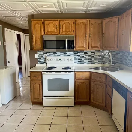 Rent this 3 bed apartment on 16 Reverse Lane in North Wantagh, NY 11793